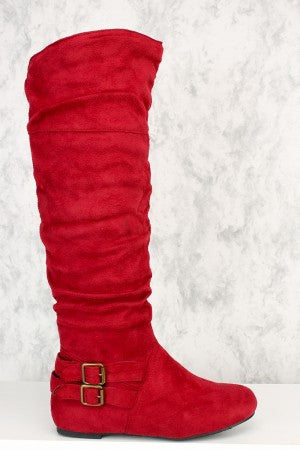 Red buckle back knee high flat boots